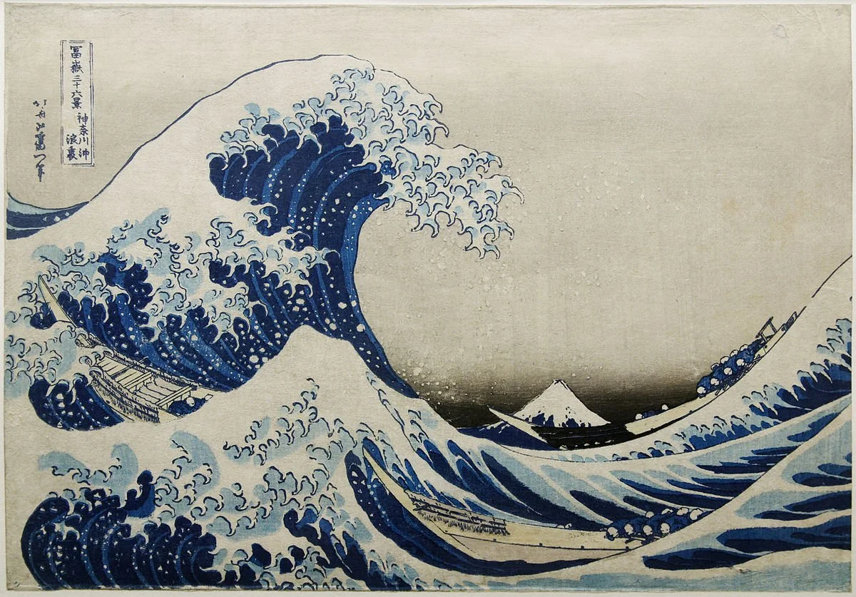 Hokusai's woodblock print The Great Wave off Kanagawa, with boats under a huge wave and Mount Fuji behind